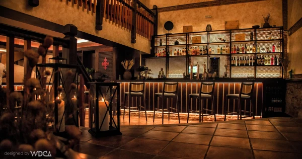 La Bodega del Canal bar with stone walls and timber counter