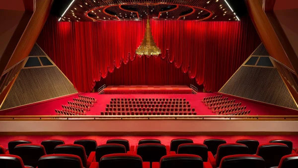 Sheraton Doha auditorium with red seating and stage
