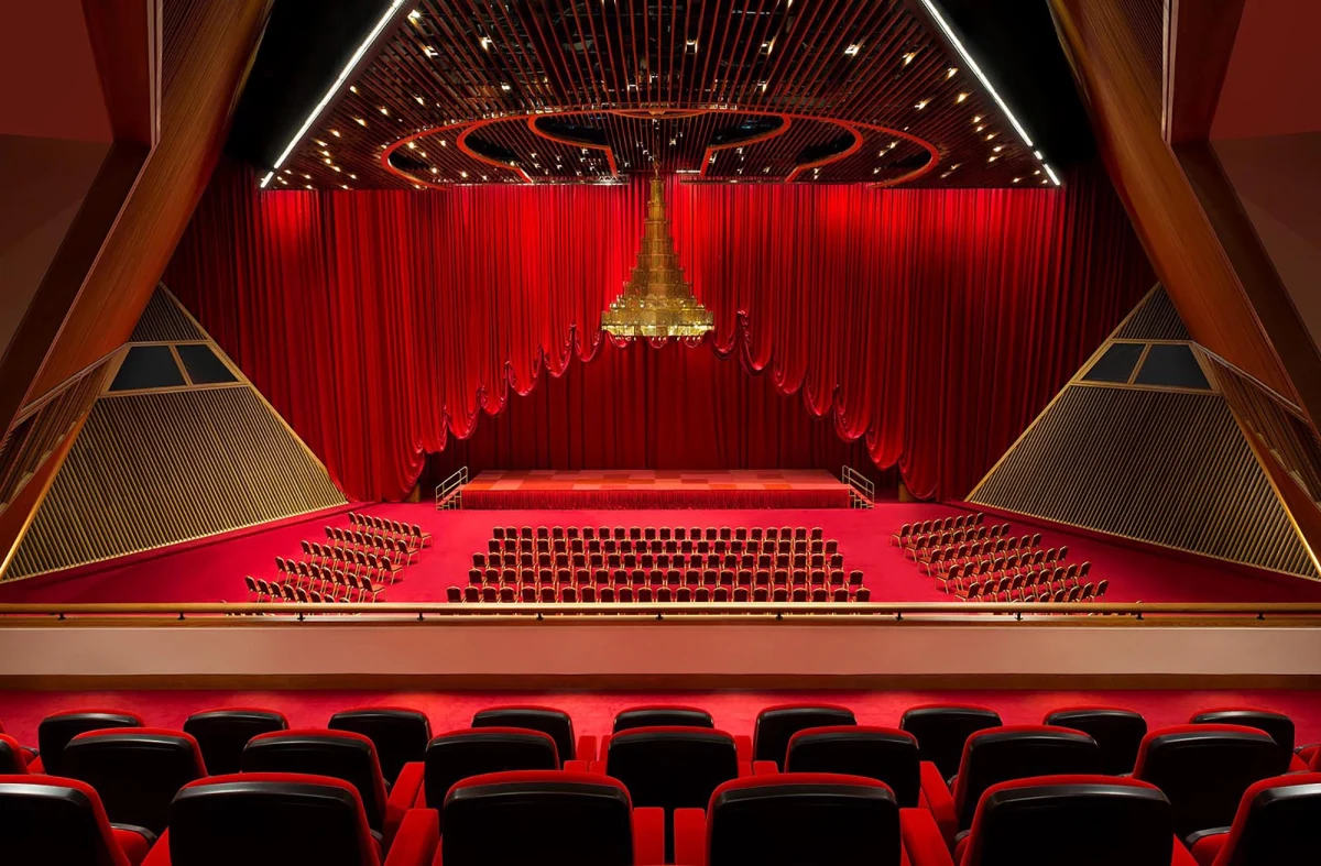 Conference-room-01-sheraton-doha-hotel-interior-design-wdca Sheraton Doha auditorium with red seating and stage