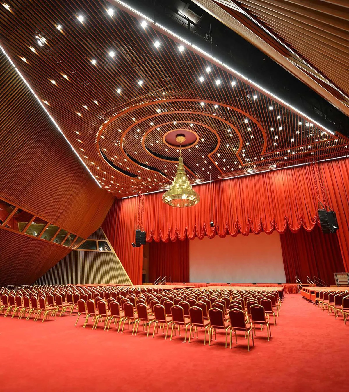 Conference-room-02-sheraton-doha-hotel-interior-design-wdca Sheraton Doha auditorium with red seating and stage