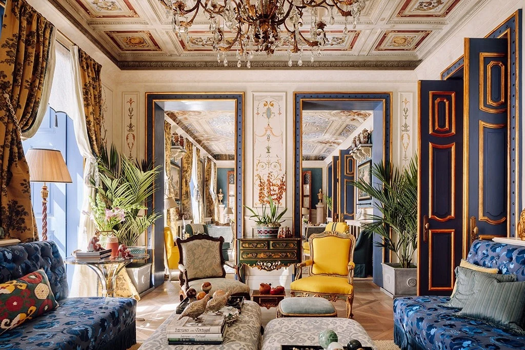 Historic interior with painted ceiling and ornate furnishings